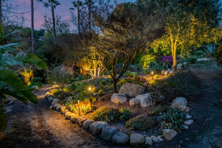 Side yard with picturesque landscaping