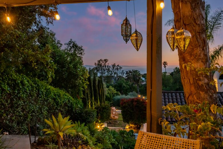 Patio seating up top with expansive views of the ocean