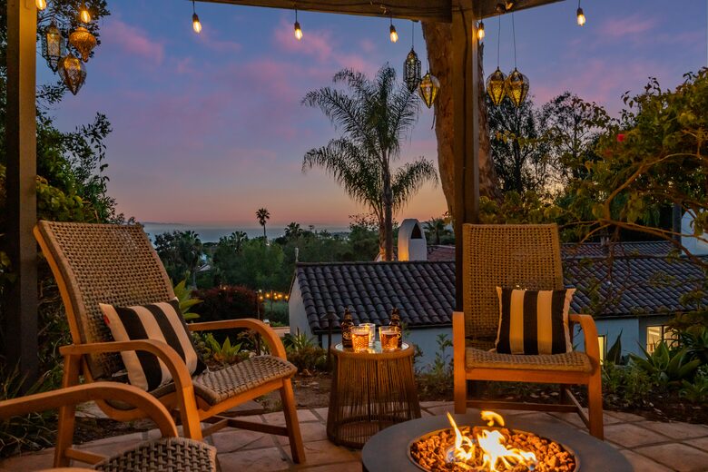 Patio seating up top with expansive views of the ocean
