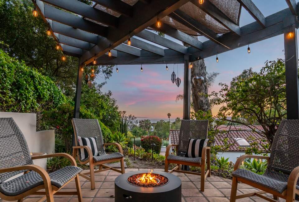 Patio seating up top with expansive views of the ocean