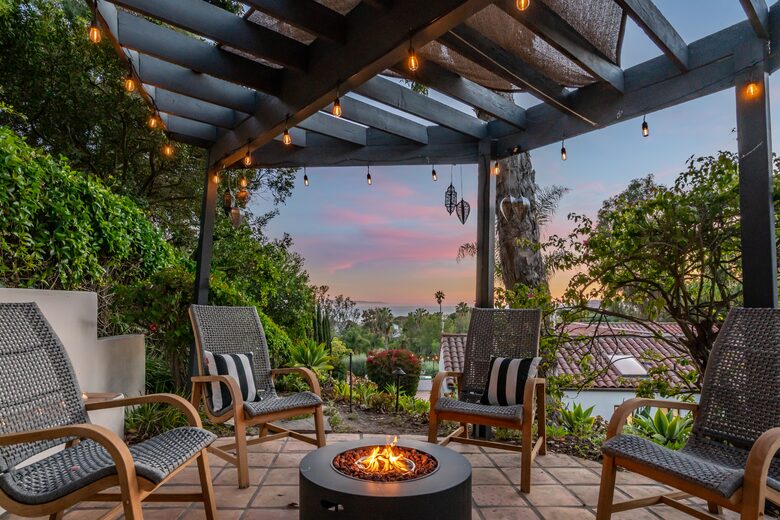 Patio seating up top with expansive views of the ocean