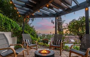 Patio seating up top with expansive views of the ocean