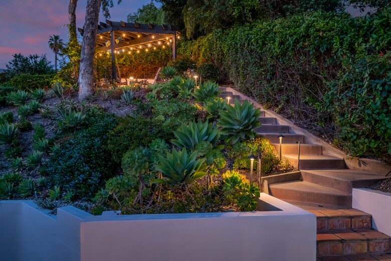 Patio seating up top with expansive views of the ocean