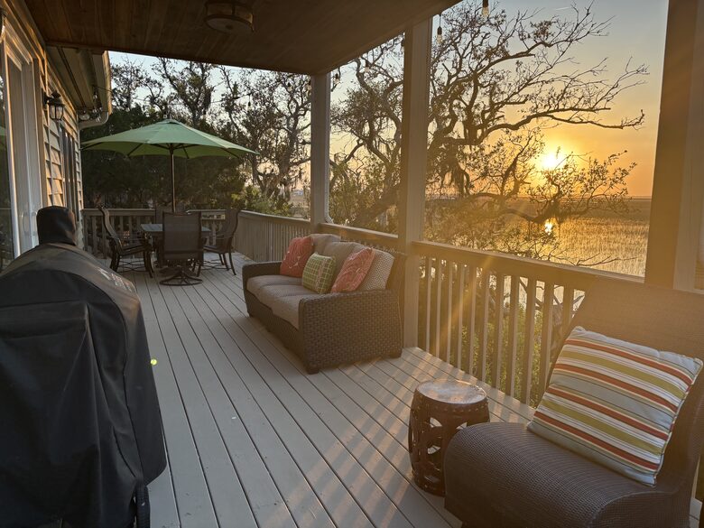 Main level deck with seating and dining area for 6