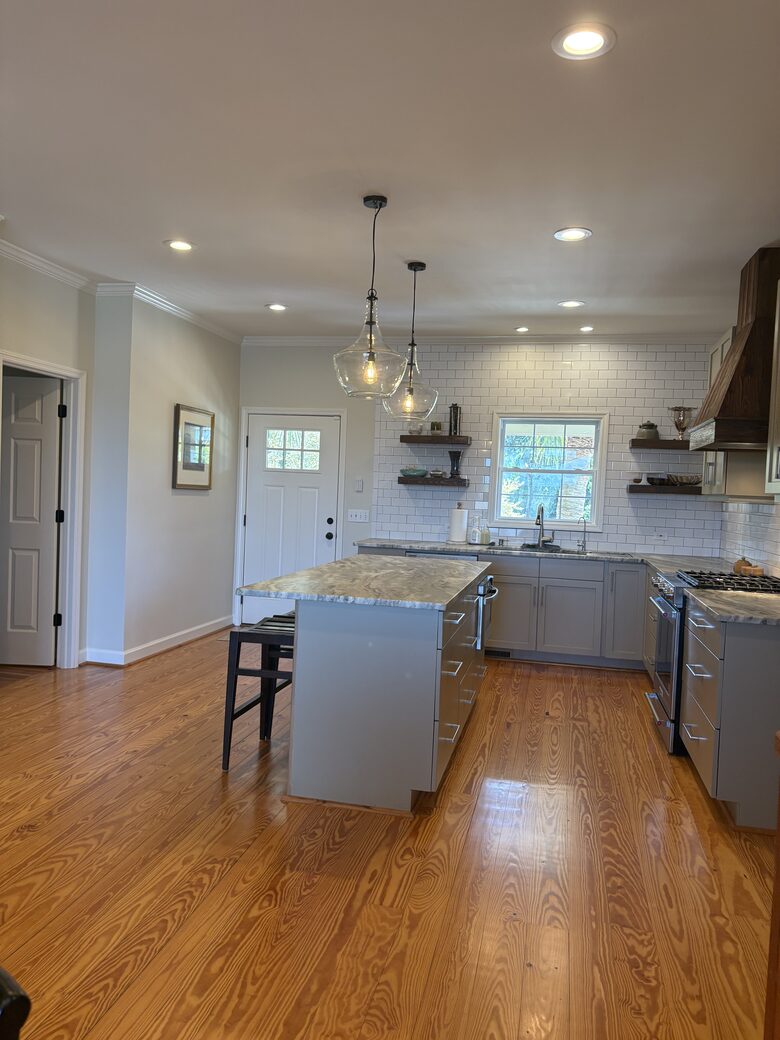 Kitchen with island seating for 3