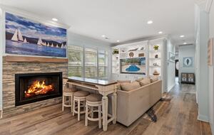 Great room with 80 inch TV. Includes all streaming services.