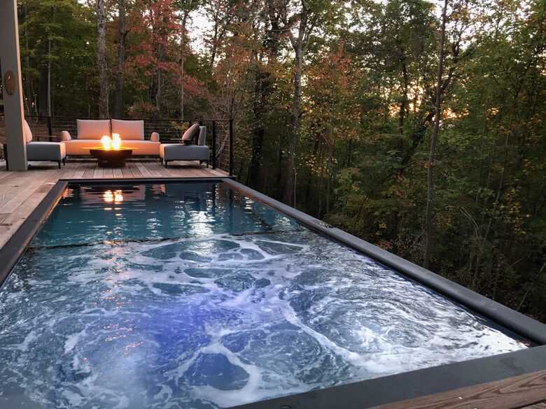 Pool with hot tub, fire pit and outdoor seating and lounge
