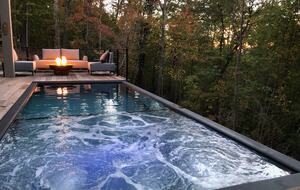 Pool with hot tub, fire pit and outdoor seating and lounge