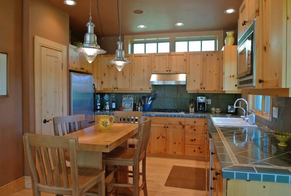 Beautiful kitchen with breakfast table or for appetizers with friends.