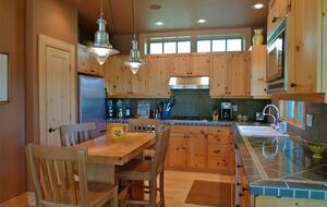 Beautiful kitchen with breakfast table or for appetizers with friends.