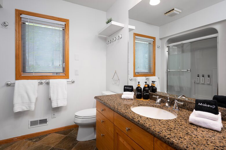 Main floor bathroom has double sinks