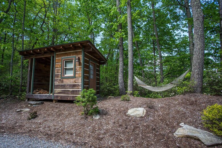 Wood storage shed and hammock