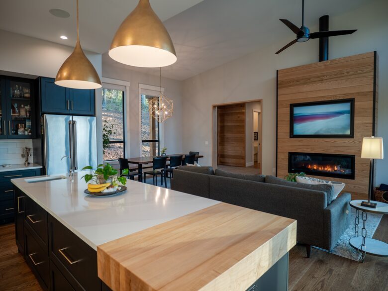 Kitchen, dining and living room with fireplace