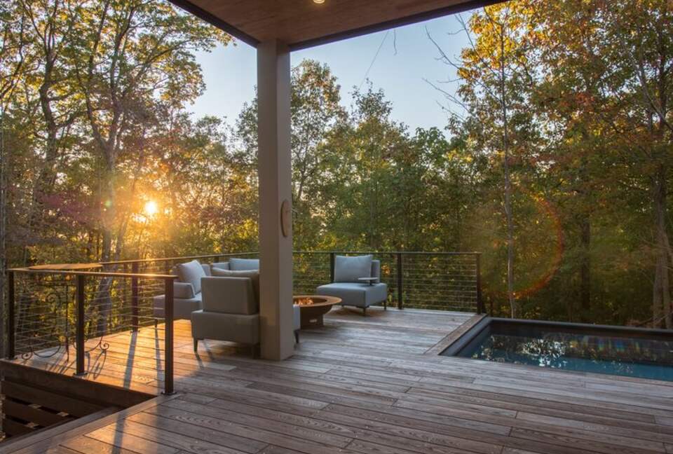 Pool, hot tub with fire pit and lounge area