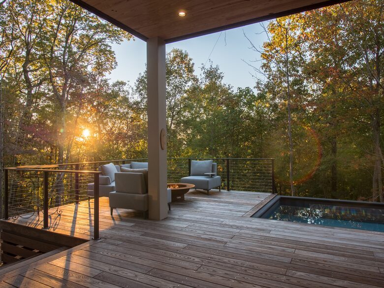 Pool, hot tub with fire pit and lounge area