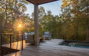 Pool, hot tub with fire pit and lounge area