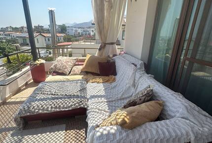 leather loungue couches on top balcony with sea views
