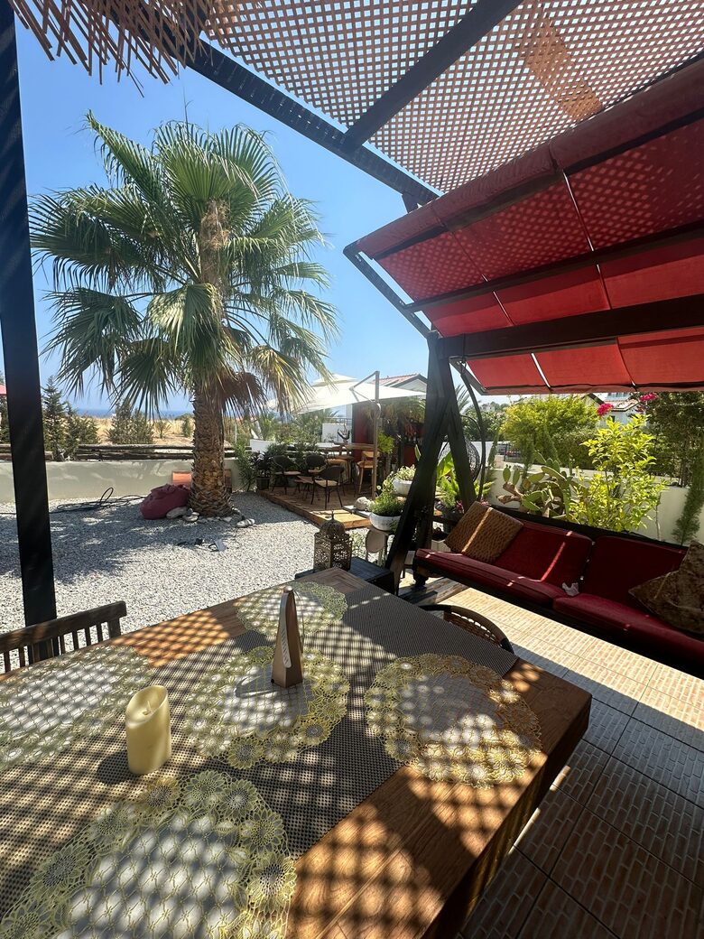 Hollywood swing chair and Bar garden view
