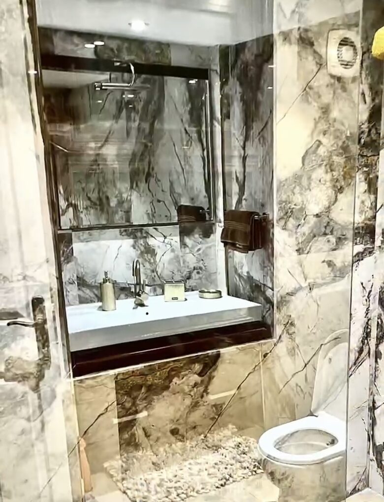Master bathroom with washing machine and dryer
