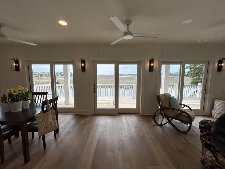 Waterfront Den Opening to Covered Deck