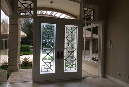 Bonita Bay Estate Home with glass walled dining room overlooking 10,000 gallon pond. - Bonita Springs, Florida