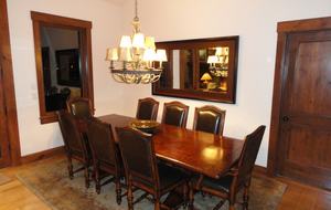 Dining area sets 8, plus 4 at counter and 2 at game table
