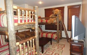 4th (kids) bedroom 2 sets of twin bunks, sofa, and in-suite bathroom