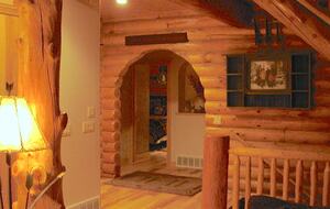 Archway to master and cowboy bedroom