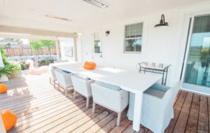 South deck dining area adjacent to the bar/barbecue area