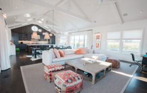 The great room with the living, dining. and kitchen areas.