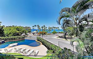 Beach condo view of pool and ocean