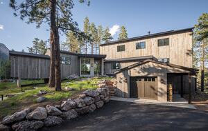 Exterior view of custom Durango Mountain Home and garage