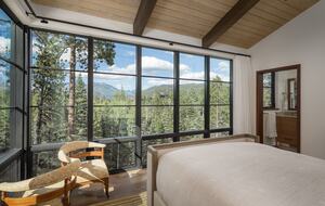 View from the master bed looking out towards the mountains