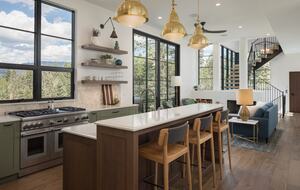 Kitchen island and family room with 10' sliding glass door.