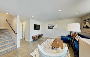 Stairs leading to bottom floor living room