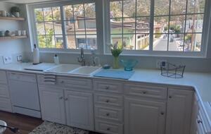 Home exchange in Avalon, CA, kitchen with mountain views from windows