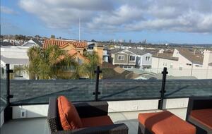 Home exchange in Newport Beach CA, rooftop deck with furniture
