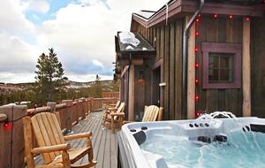 Home exchange in Breckenridge CO, deck with hot tub and seating