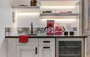 Home exchange in Breckenridge CO, wet bar with sink & beverage cooler