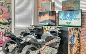 Home exchange in Kissimmee FL, loft with motocross arcade game