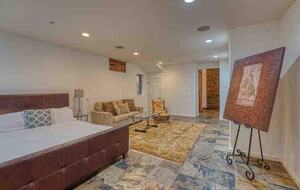 Home exchange in Calistoga CA, basement bedroom with king bed & couch