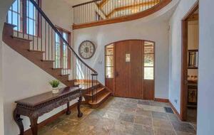 Home exchange in Calistoga CA, interior entryway with grand staircase