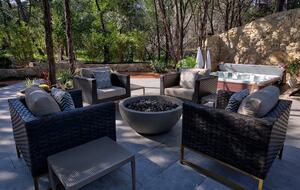 Home exchange in Spicewood TX, propane fire pit with four chairs