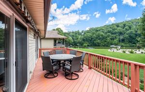 Home Exchange in Bella Vista, AR, top deck with views of water
