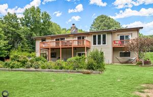 Home Exchange in Bella Vista, AR, view of back of home