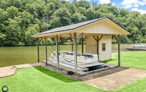 Home Exchange in Bella Vista, AR, boat dock and house