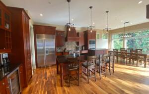 Home Exchange in British Columbia grand kitchen with wood floors