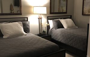 Home Exchange in Orange Beach, AL, guest bedroom with two full beds