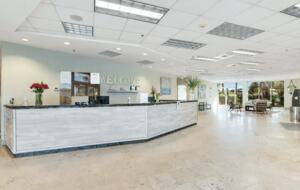 Home Exchange in Miramar Beach, FL, building front desk