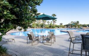 Home Exchange in Miramar Beach, FL, resort style pool with lounge